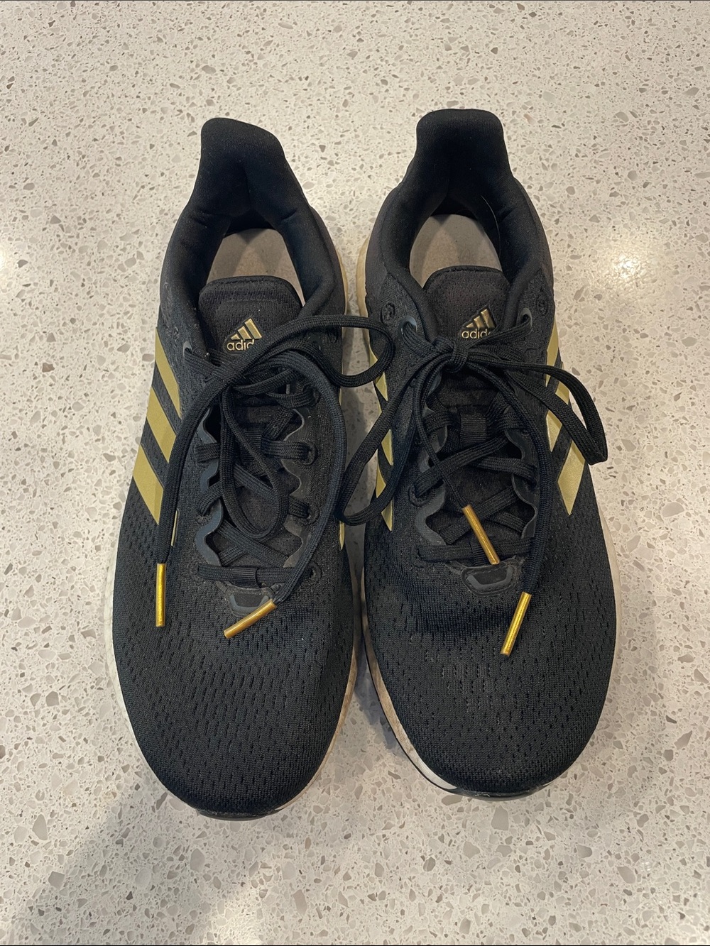 adidas Black Sneakers with Gold Accents